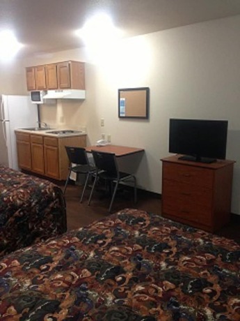 Imagen de la habitación del Hotel Inland Suites Lamar Street. Foto 16