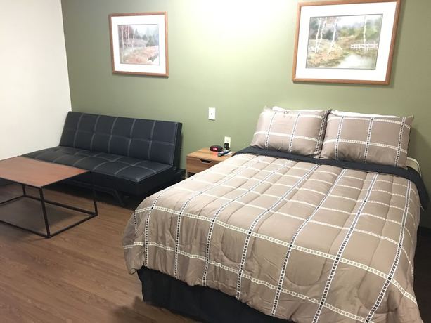 Imagen de la habitación del Hotel Inland Suites Lamar Street. Foto 19
