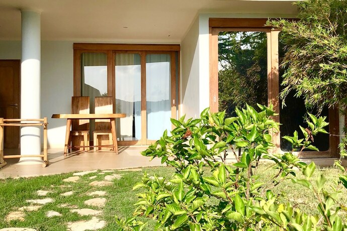 Imagen de la habitación del Hotel Inlight Lombok Eco Resort. Foto 20
