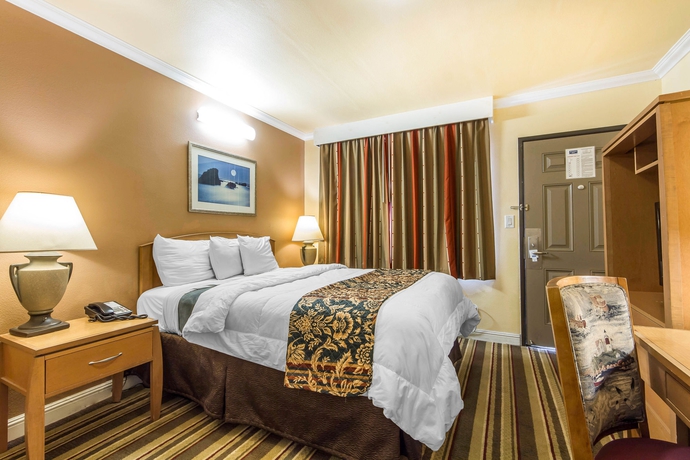 Imagen de la habitación del Hotel Inn By The Coliseum. Foto 11