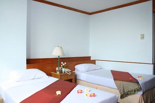 Imagen de la habitación del Hotel Inn Come Suite Bangkok. Foto 3
