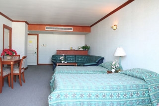 Imagen de la habitación del Hotel Inn Come Suite Bangkok. Foto 4