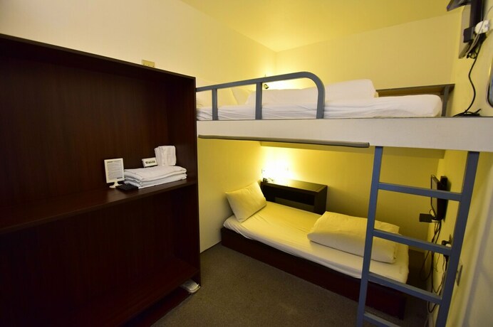 Imagen de la habitación del Hotel Inn Cube Ximen. Foto 12