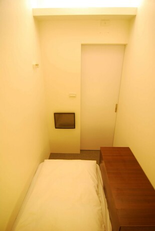 Imagen de la habitación del Hotel Inn Cube Ximen. Foto 13