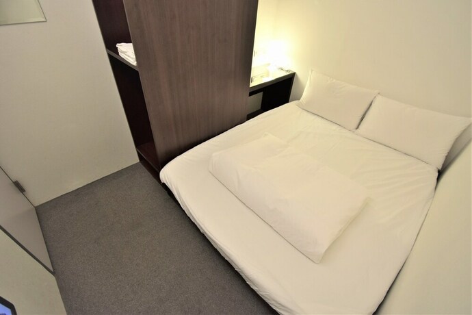 Imagen de la habitación del Hotel Inn Cube Ximen. Foto 14