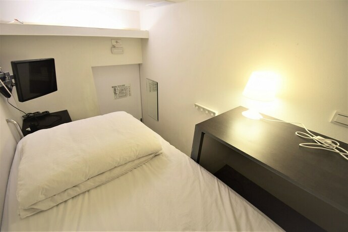 Imagen de la habitación del Hotel Inn Cube Ximen. Foto 17