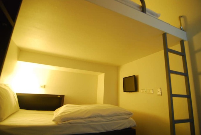 Imagen de la habitación del Hotel Inn Cube Ximen. Foto 21