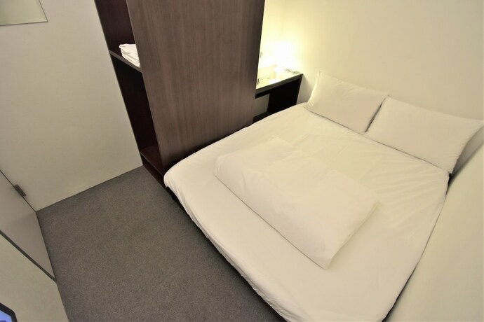 Imagen de la habitación del Hotel Inn Cube Ximen. Foto 22