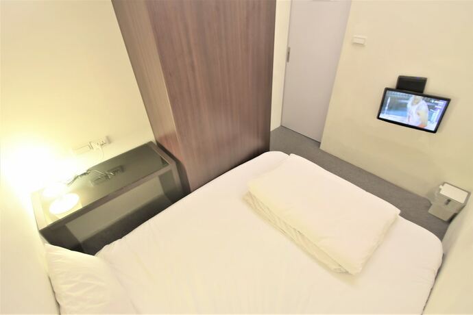 Imagen de la habitación del Hotel Inn Cube Ximen. Foto 26