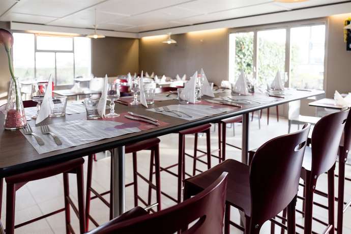 Imagen del bar/restaurante del Hotel Inn Design Laval. Foto 3