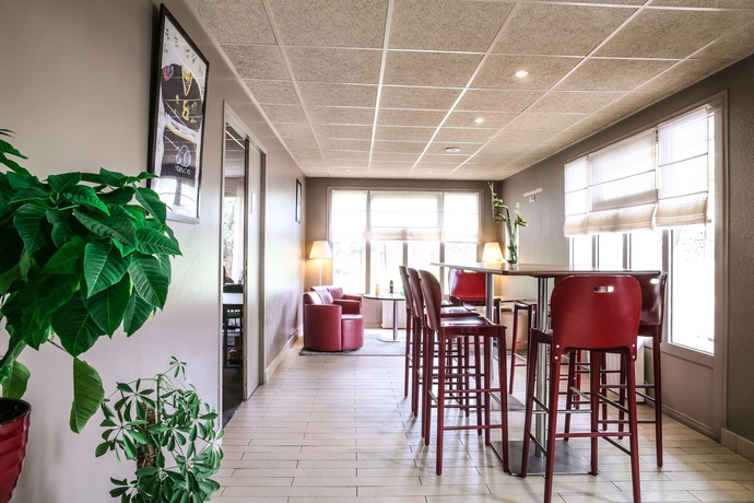 Imagen de los interiores del Hotel Inn Design Resto Novo Sainte Luce Sur Loire. Foto 19