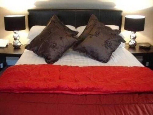 Imagen de la habitación del Hotel Inn For All Seasons. Foto 13