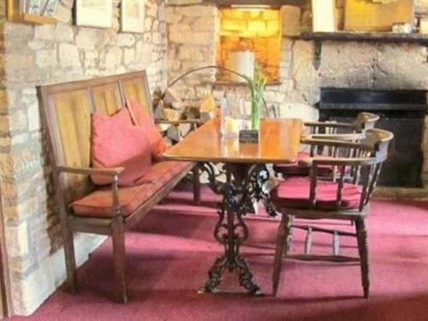 Imagen del bar/restaurante del Hotel Inn For All Seasons. Foto 10