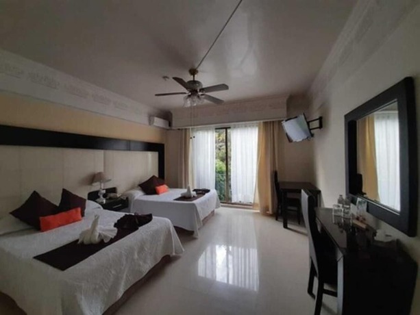 Imagen de la habitación del Hotel Inn Galerias. Foto 7