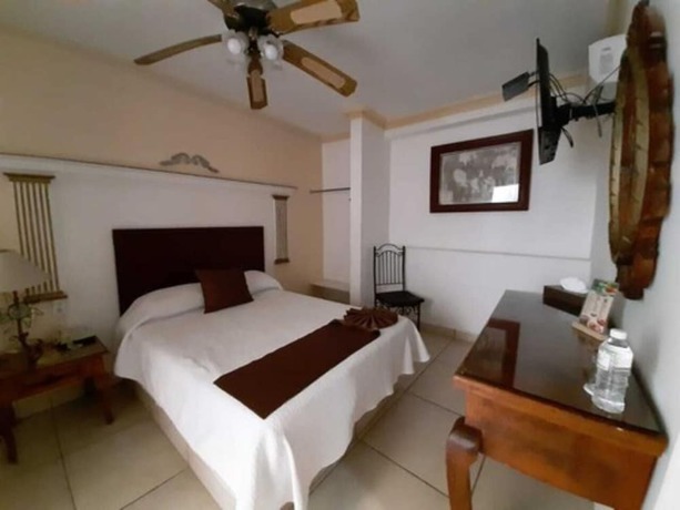Imagen de la habitación del Hotel Inn Galerias. Foto 9