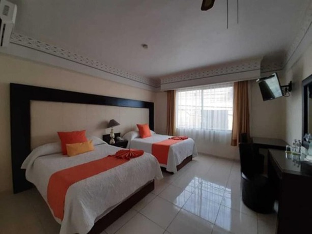 Imagen de la habitación del Hotel Inn Galerias. Foto 10