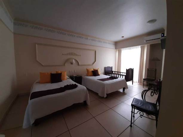 Imagen de la habitación del Hotel Inn Galerias. Foto 12