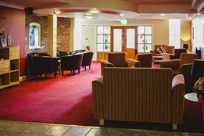 Imagen de los interiores del Hotel Inn On The Coast. Foto 8