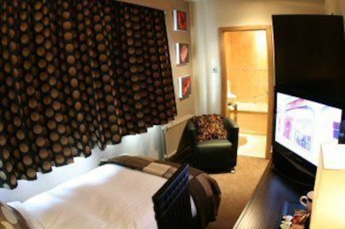 Imagen de la habitación del Hotel Inn On The Prom. Foto 12