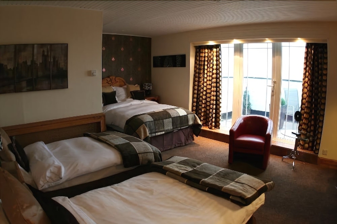 Imagen de la habitación del Hotel Inn On The Prom. Foto 14