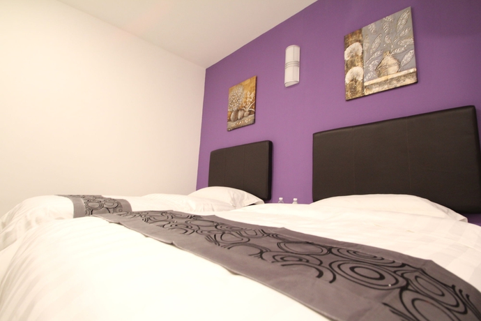 Imagen de la habitación del Hotel Inn Residence 18. Foto 9