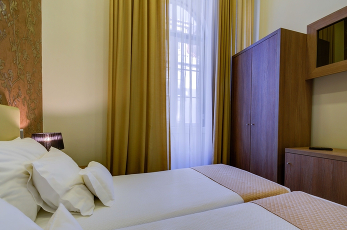 Imagen de la habitación del Hotel Inn Rossio. Foto 14