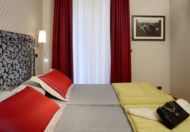 Imagen de la habitación del Hotel Inn Spagna. Foto 14