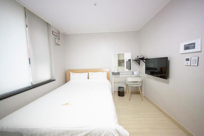 Imagen de la habitación del Hotel Inn The City Business Hotel. Foto 11