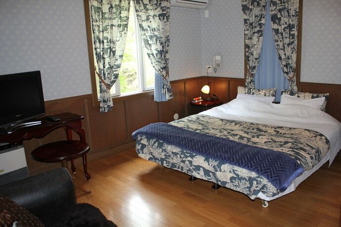 Imagen de la habitación del Hotel Inn The Mist. Foto 19