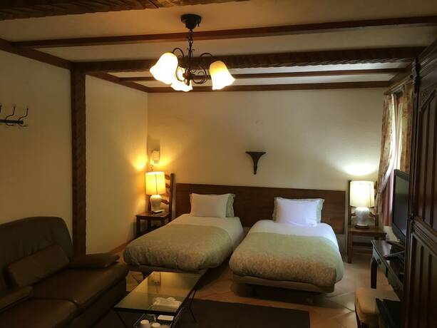 Imagen de la habitación del Hotel Inn The Mist. Foto 20