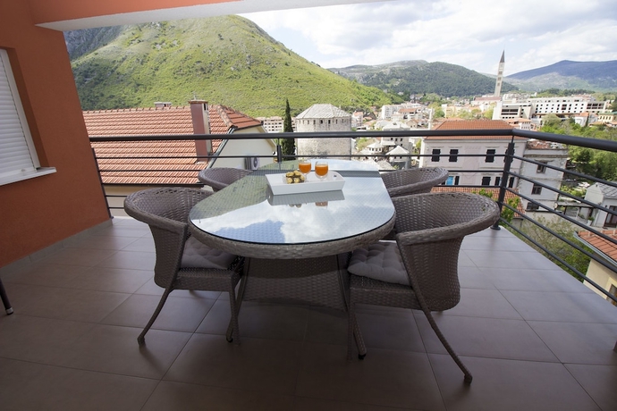 Imagen de la habitación del Hotel Inn Town Residence. Foto 2