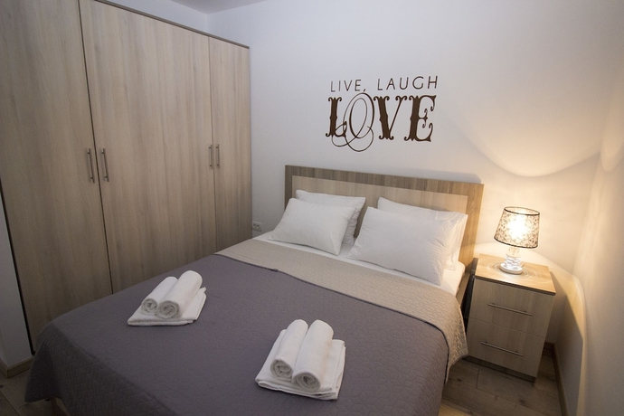 Imagen de la habitación del Hotel Inn Town Residence. Foto 5