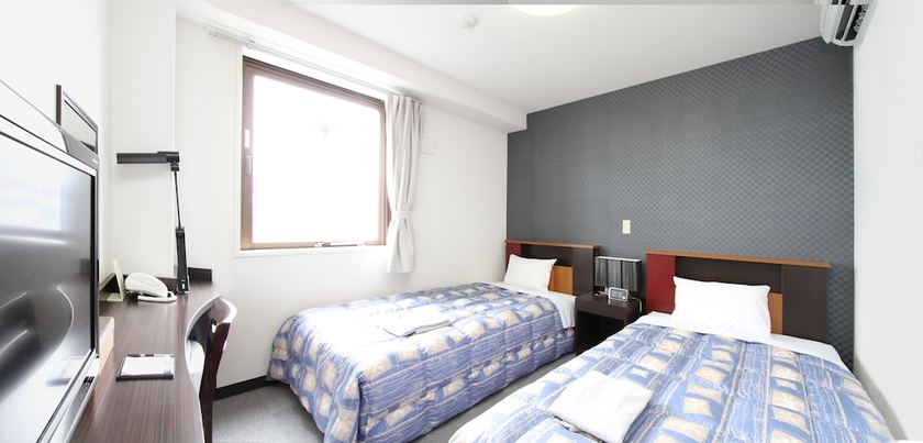 Imagen de la habitación del Hotel Inn Tsuruoka. Foto 5