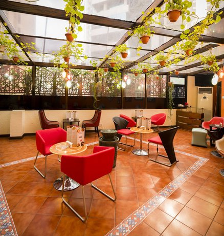 Imagen del bar/restaurante del Hotel Inn and Go Kuwait Plaza. Foto 3