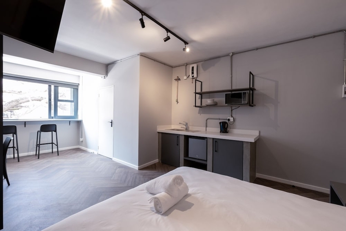 Imagen de la habitación del Hotel Inn and Out Plus. Foto 1