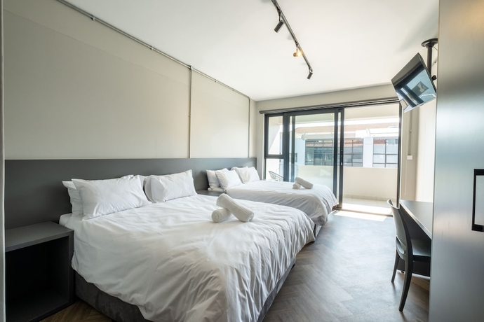 Imagen de la habitación del Hotel Inn and Out Plus. Foto 4
