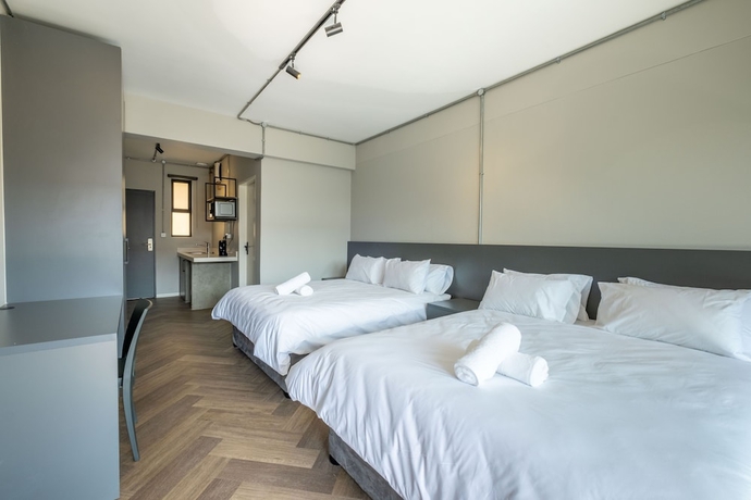 Imagen de la habitación del Hotel Inn and Out Plus. Foto 5