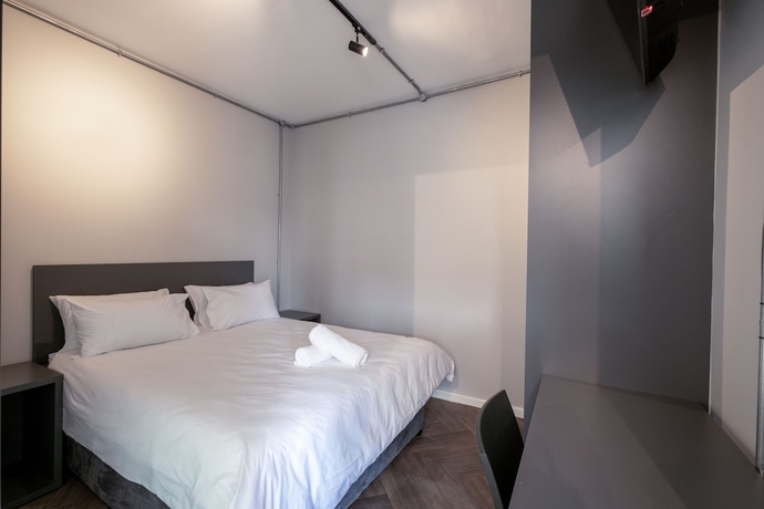 Imagen de la habitación del Hotel Inn and Out Plus. Foto 13