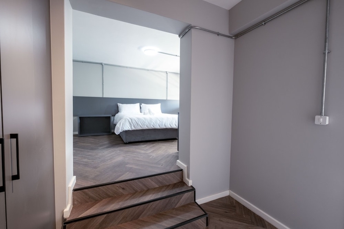 Imagen de la habitación del Hotel Inn and Out Plus. Foto 16
