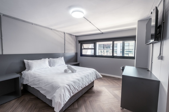 Imagen de la habitación del Hotel Inn and Out Plus. Foto 17