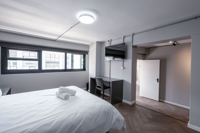 Imagen de la habitación del Hotel Inn and Out Plus. Foto 18