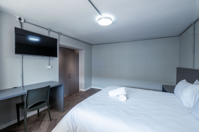 Imagen de la habitación del Hotel Inn and Out Plus. Foto 19