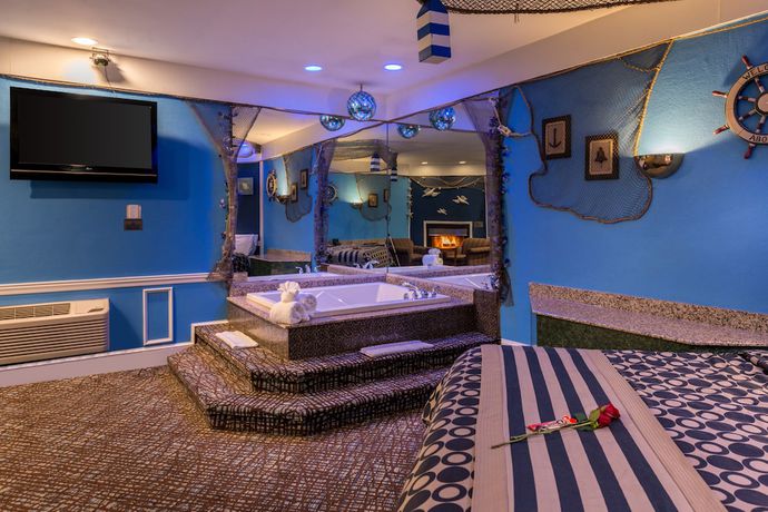 Imagen de la habitación del Hotel Inn of the Dove Romantic Suites with Jetted Tub and Fireplace. Foto 5