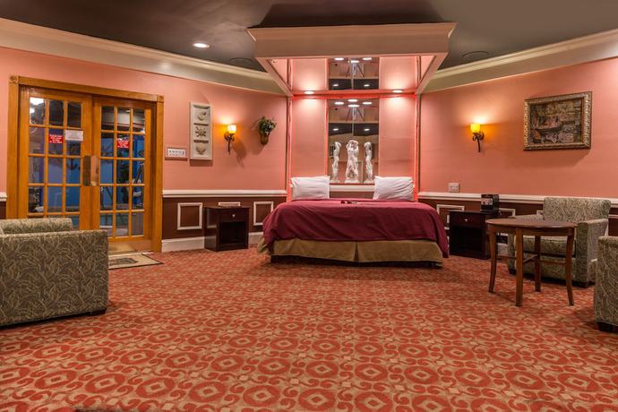 Imagen de la habitación del Hotel Inn of the Dove Romantic Suites with Jetted Tub and Fireplace. Foto 7