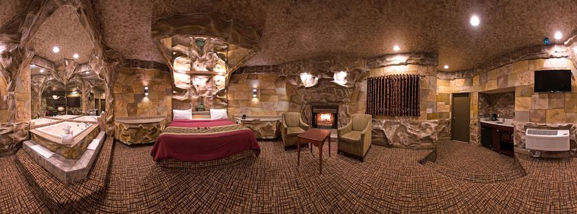 Imagen de la habitación del Hotel Inn of the Dove Romantic Suites with Jetted Tub and Fireplace. Foto 10