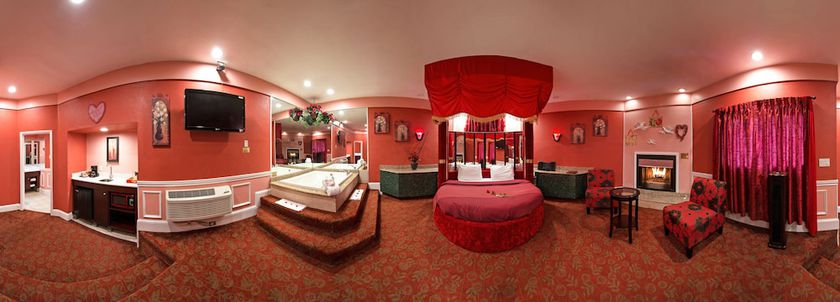 Imagen de la habitación del Hotel Inn of the Dove Romantic Suites with Jetted Tub and Fireplace. Foto 12