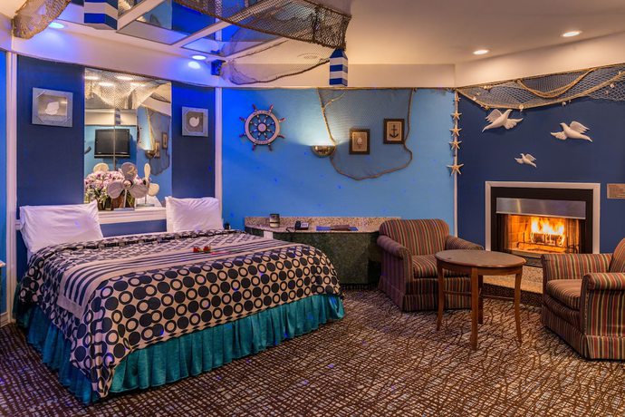 Imagen de la habitación del Hotel Inn of the Dove Romantic Suites with Jetted Tub and Fireplace. Foto 13