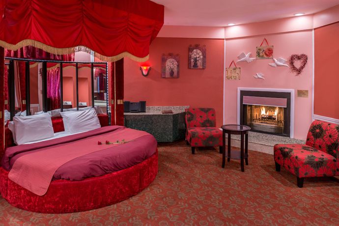 Imagen de la habitación del Hotel Inn of the Dove Romantic Suites with Jetted Tub and Fireplace. Foto 16