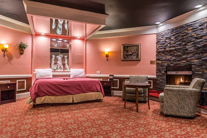 Imagen de la habitación del Hotel Inn of the Dove Romantic Suites with Jetted Tub and Fireplace. Foto 17