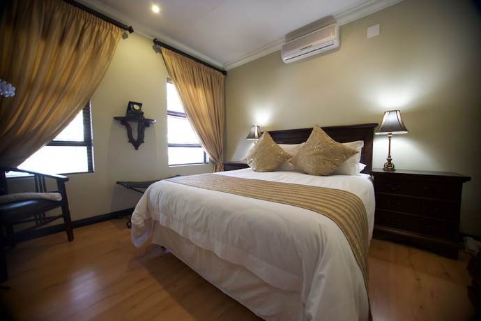 Imagen de la habitación del Hotel InnJoy Boutique. Foto 13
